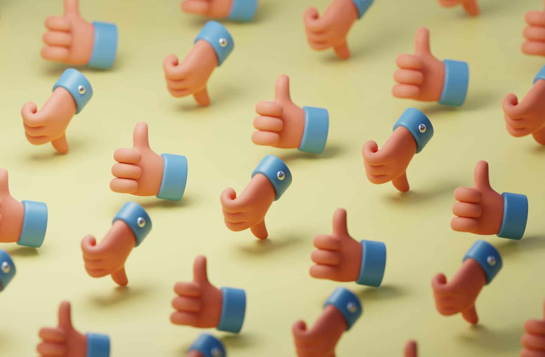 clay hands with thumbs up and thumbs down