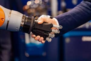 robot handshake businessman