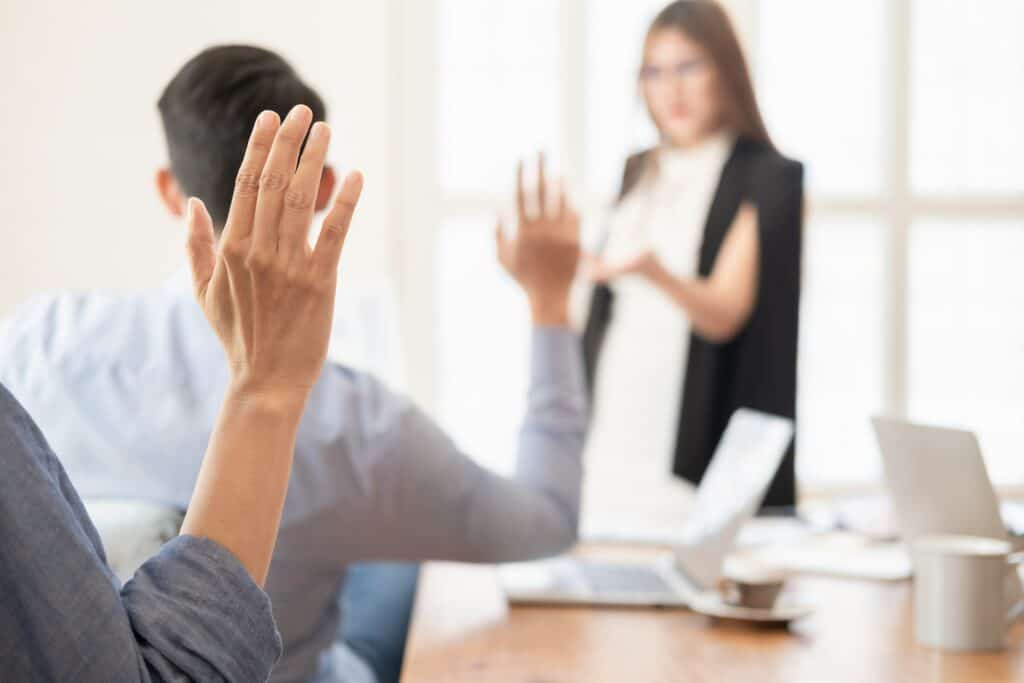 raised hands during sales training