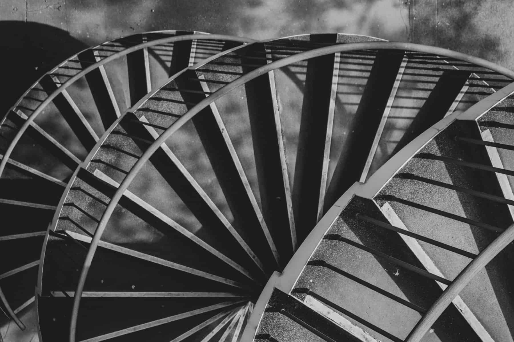 spiral metal staircase in black and white