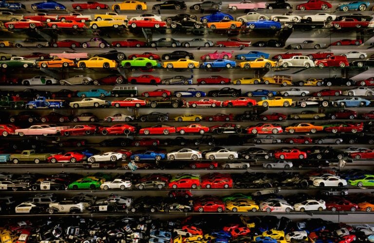 rows and rows of brightly colored toy cars and trucks
