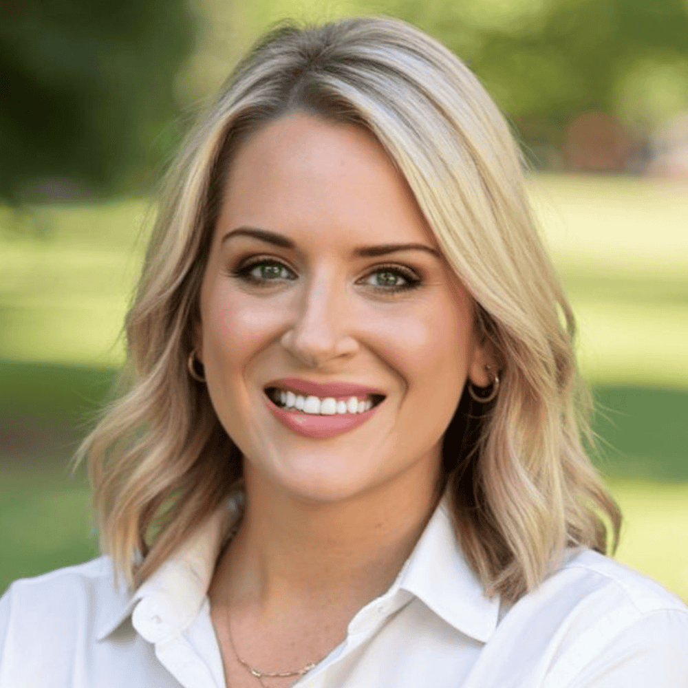 professional corporate headshot of a female sales consultant